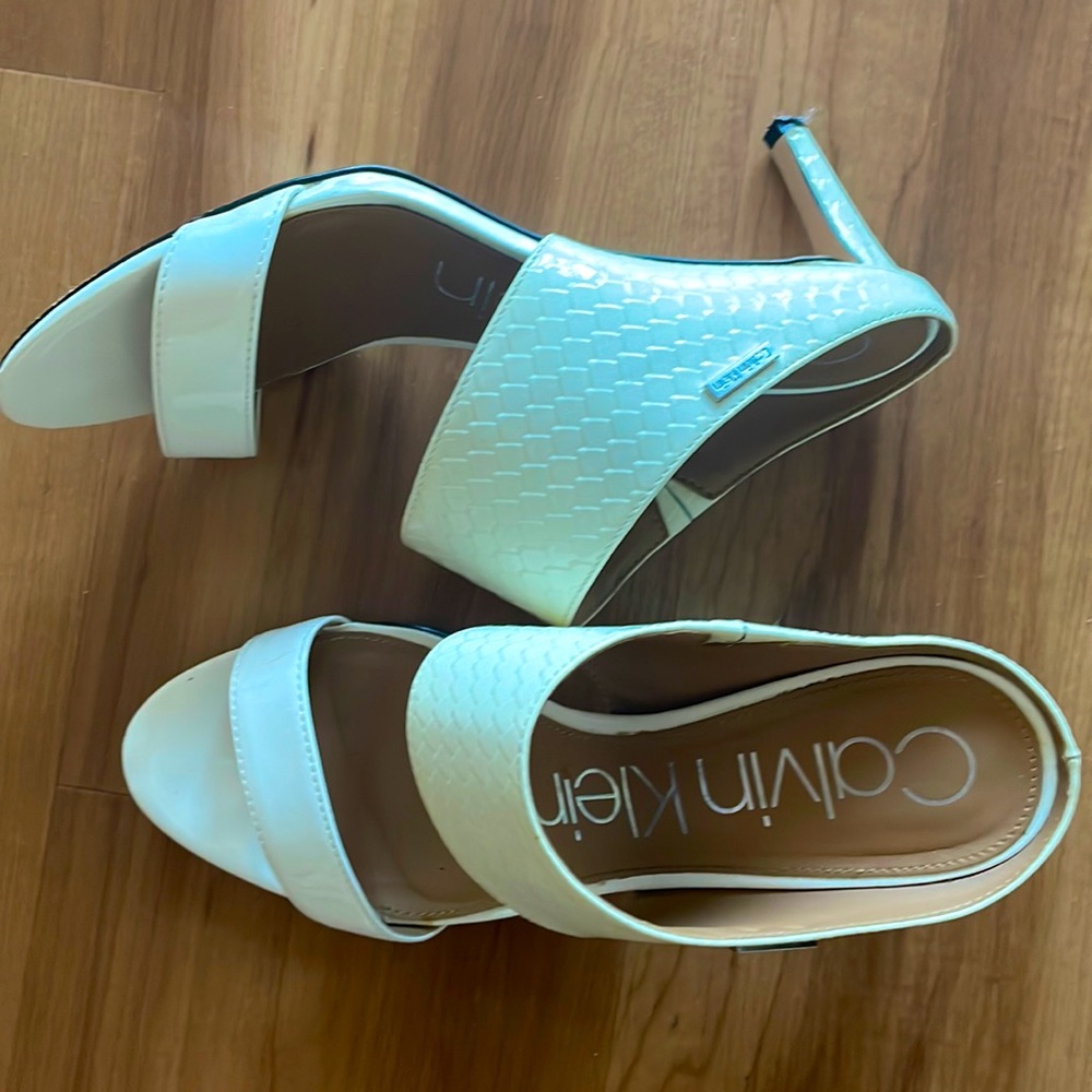 Calvin Klein sandal, two-strap silhouette balanced by a low, slender heel